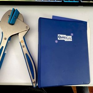Quickutz Hand Tool and Small Binder of Embossing Dies